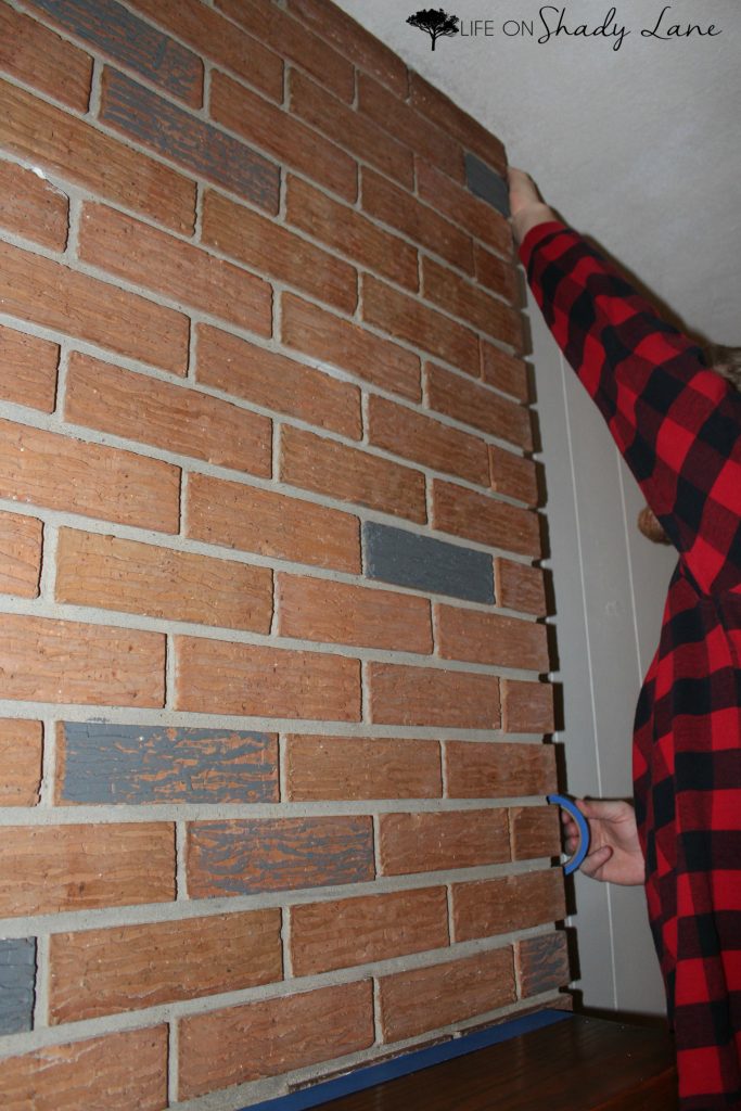 How to Whitewash a Brick Fireplace via Life on Shady Lane blog || Kansas City life, home, and style blogger Megan Wilson shares a step by step fireplace makeover guide! || www.lifeonshadylane.com 