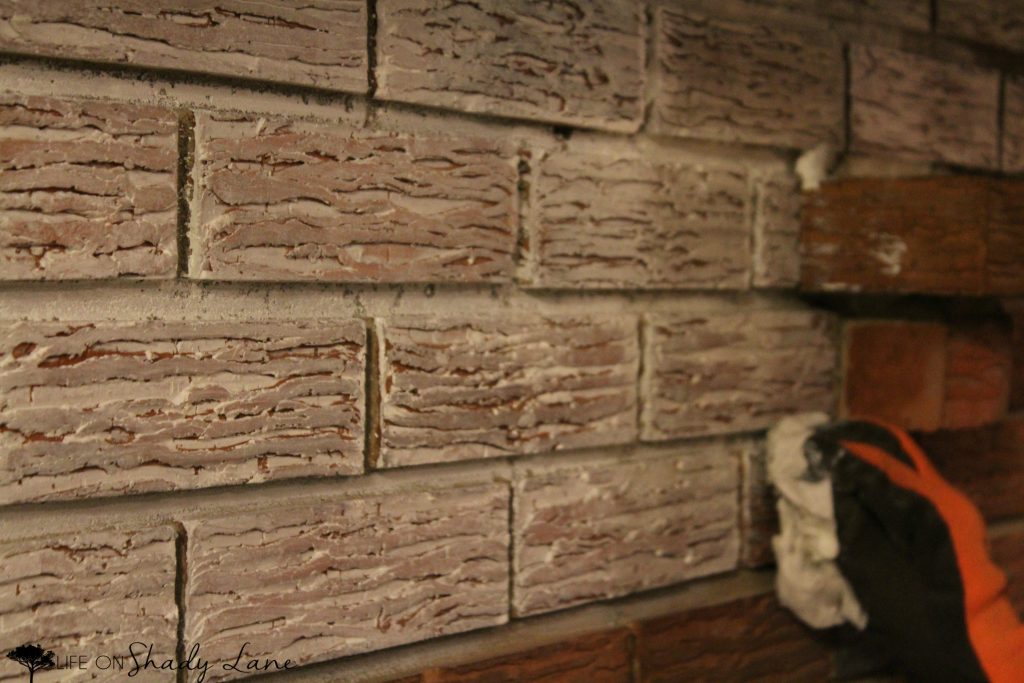 How to Whitewash a Brick Fireplace via Life on Shady Lane blog || Kansas City life, home, and style blogger Megan Wilson shares a step by step fireplace makeover guide! || www.lifeonshadylane.com 