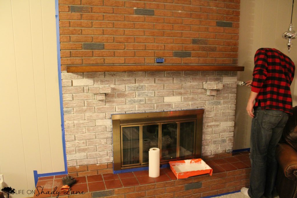 How to Whitewash a Brick Fireplace via Life on Shady Lane blog || Kansas City life, home, and style blogger Megan Wilson shares a step by step fireplace makeover guide! || www.lifeonshadylane.com 