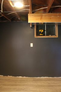 Man Cave Update: Painted Drywall and Flooring via Life on Shady Lane Blog