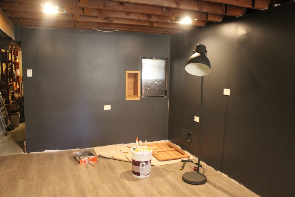 Man Cave Update: Painted Drywall and Flooring via Life on Shady Lane blog