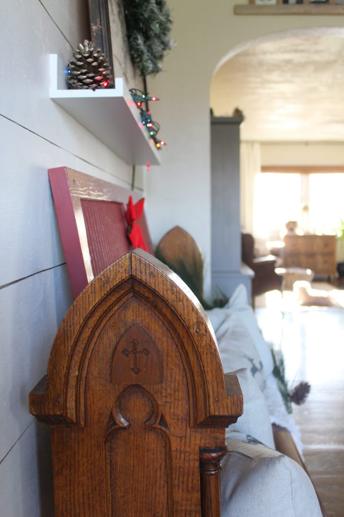 Antique church pew and christmas pillows via Life on Shady Lane blog