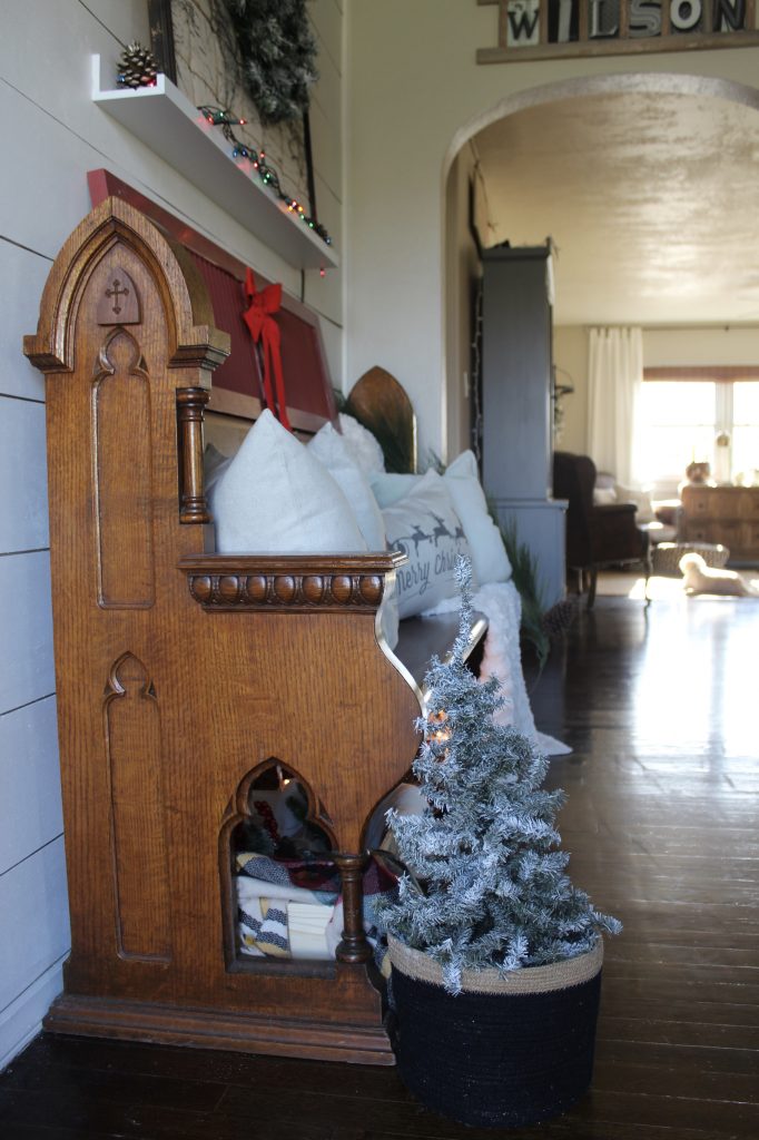 Antique church pew and christmas pillows via Life on Shady Lane blog