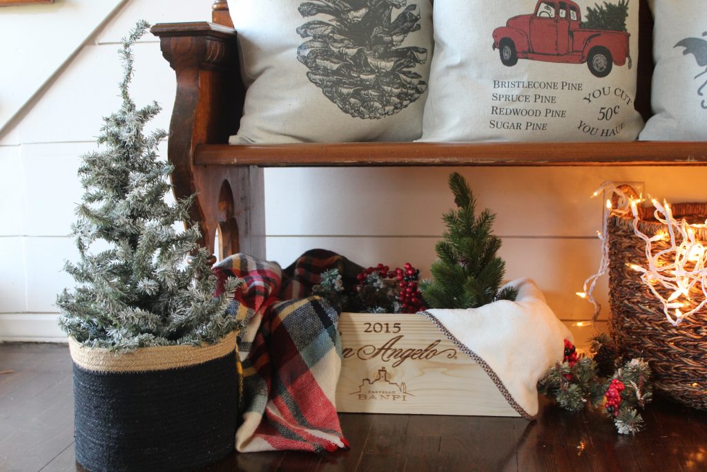 Antique church pew and Christmas pillows via Life on Shady Lane blog