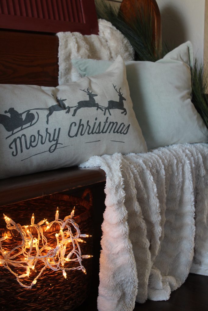Antique church pew and christmas pillows via Life on Shady Lane blog