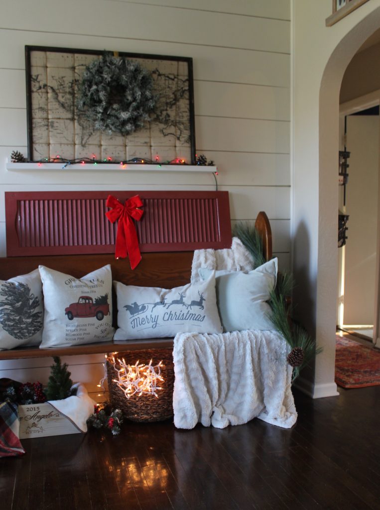 Antique church pew and christmas pillows via Life on Shady Lane blog