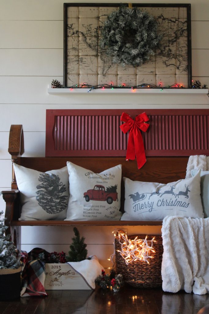 Antique church pew and christmas pillows via Life on Shady Lane blog