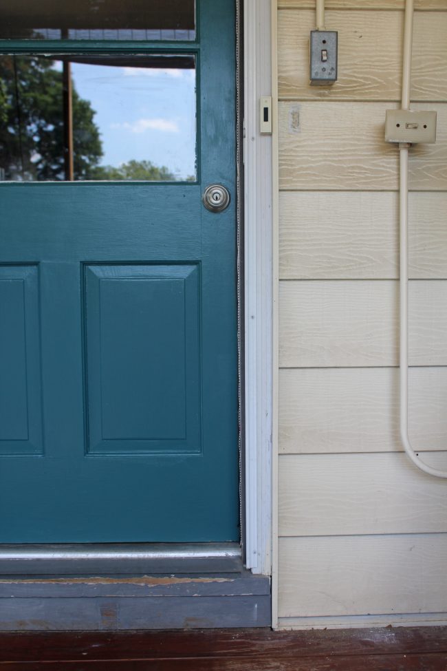 A quick and easy door makeover, teal exterior door and yellow house