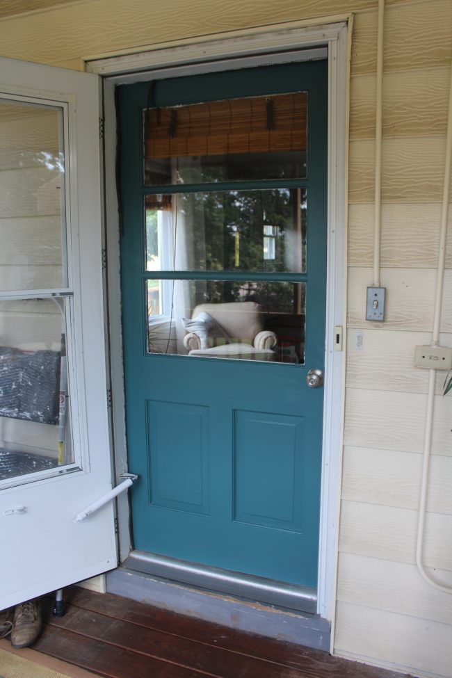 A quick and easy door makeover, teal exterior door and yellow house