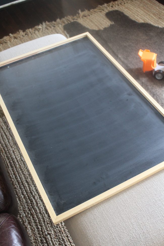 A DIY pallet wood framed chalkboard - inexpensive and simple way to make over a cheap chalkboard! #diy #project