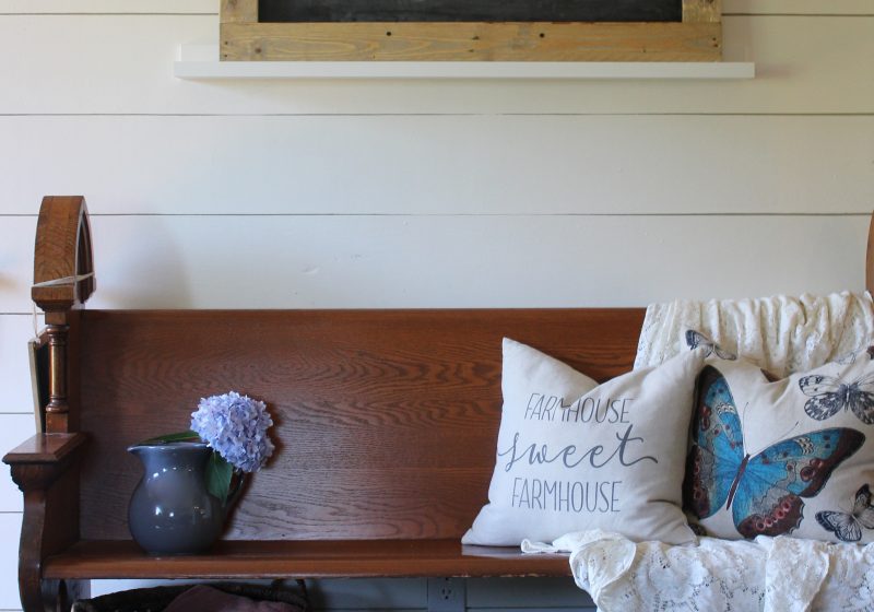 A DIY pallet wood framed chalkboard - inexpensive and simple way to make over a cheap chalkboard!