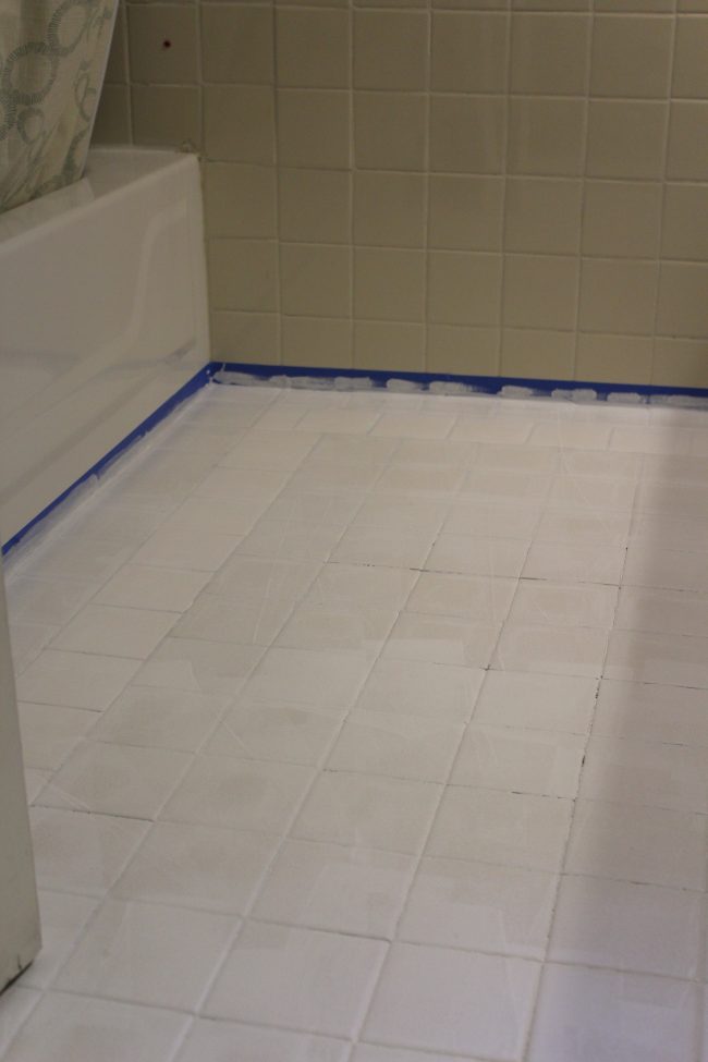 DIY: How to EASILY paint your tile floor for a budget friendly modern update! - Black and White Stenciled Bathroom Floor