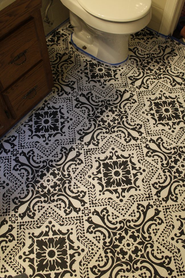 DIY: How to EASILY paint your tile floor for a budget friendly modern update! - Black and White Stenciled Bathroom Floor