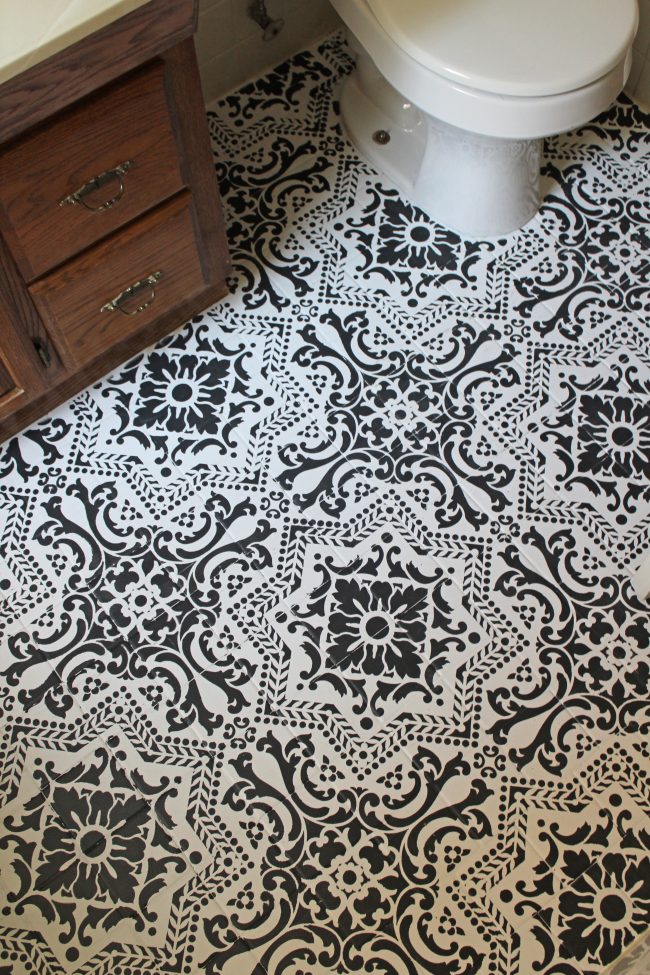 DIY: How to EASILY paint your tile floor for a budget friendly modern update! - Black and White Stenciled Bathroom Floor