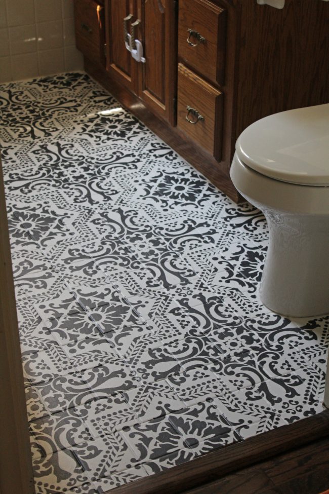 DIY: How to EASILY paint your tile floor for a budget friendly modern update! - Black and White Stenciled Bathroom Floor