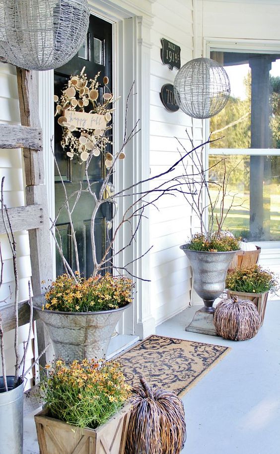 Inspiring Fall Porches - a roundup complete with traditional and non-traditional autumn colors, so there's something for everyone! 