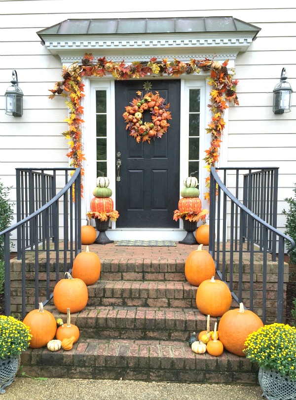 Inspiring Fall Porches - a roundup complete with traditional and non-traditional autumn colors, so there's something for everyone! 