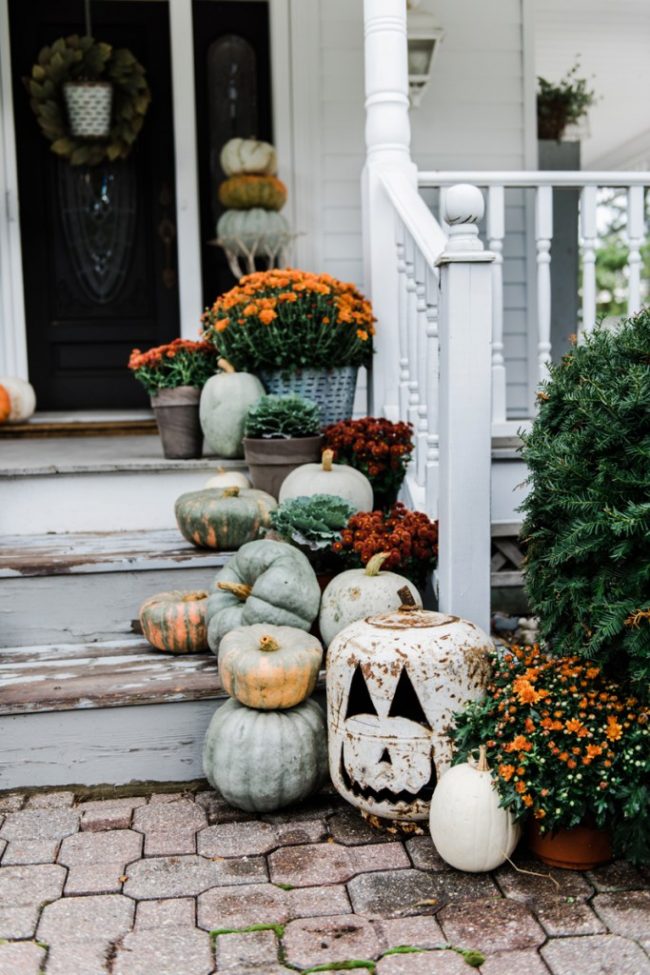 Inspiring Fall Porches - a roundup complete with traditional and non-traditional autumn colors, so there's something for everyone! 