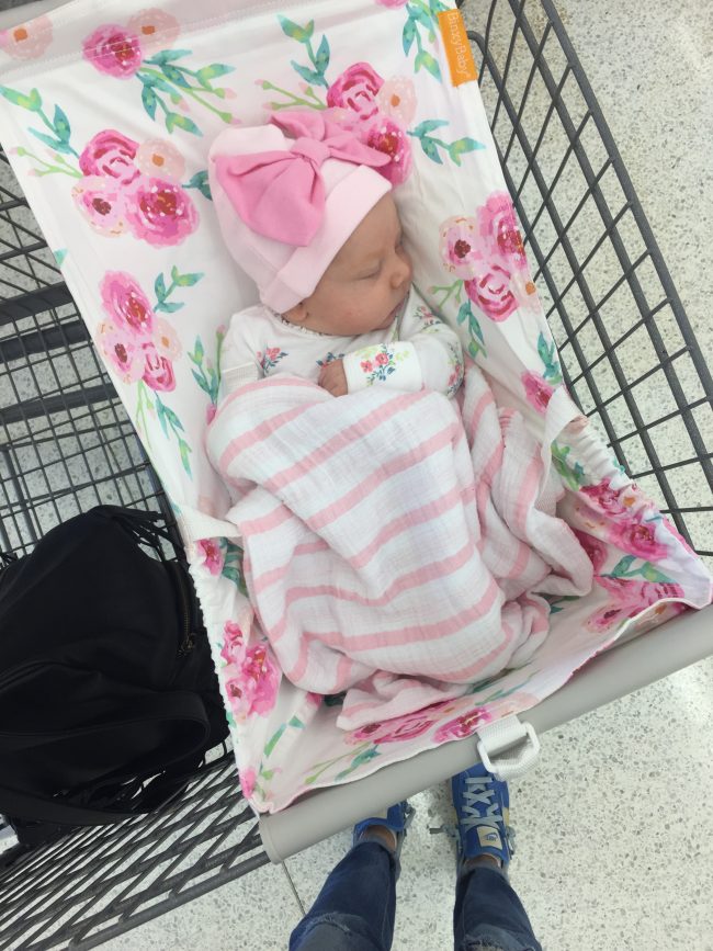 Mom hack: A shopping cart hammock for baby so there's more room in the cart for your groceries and Target 