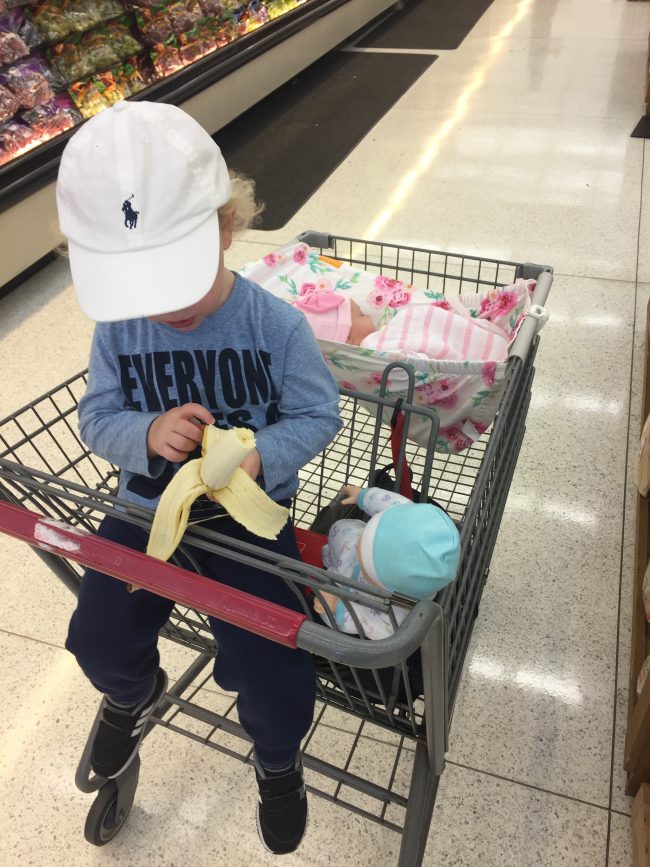 Mom hack: A shopping cart hammock for baby so there's more room in the cart for your groceries and Target 