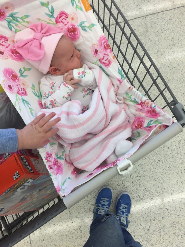 Mom hack: A shopping cart hammock for baby so there's more room in the cart for your groceries and Target 