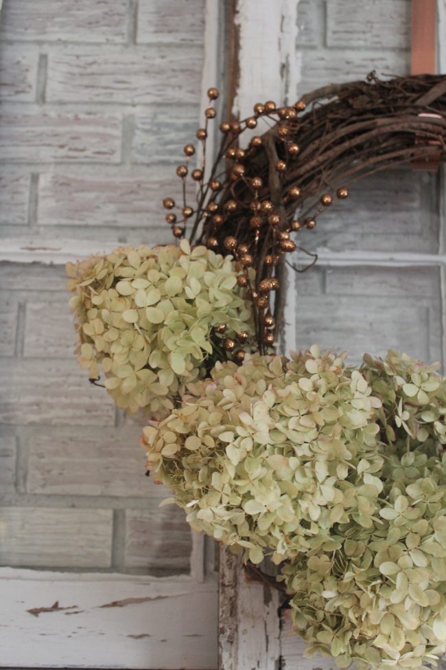 Hydrangea Wreath with Copper Accents - a simple DIY project that's SO inexpensive, but so pretty, too! Kansas City life, home, and style blogger Megan Wilson shares a DIY hydrangea wreath with copper accents | Life on Shady Lane \\ @shadylaneblog