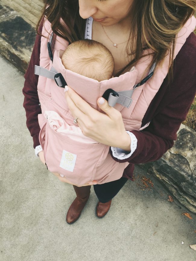 A blush pink organic cotton baby carrier - must have for moms of littles!