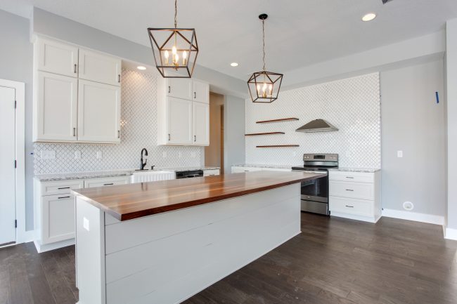 Modern farmhouse home with neutral paint colors, shiplap, and a kitchen that dreams are made of // A new home for sale in the Kansas City, Missouri area