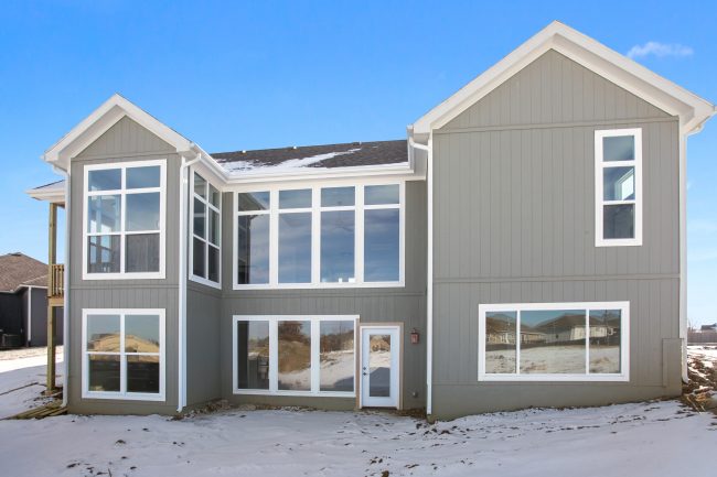 Modern farmhouse home with neutral paint colors, shiplap, and a kitchen that dreams are made of // A new home for sale in the Kansas City, Missouri area