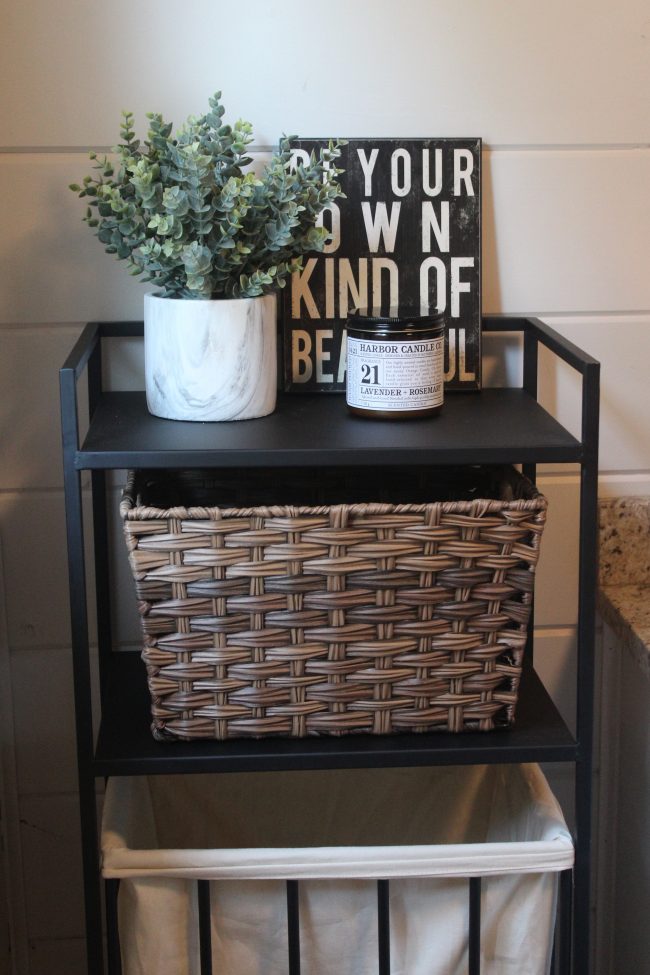 A modern farmhouse bathroom makeover - with a copper tub, copper sink, wood plank ceiling, white shiplap walls, LVT flooring, and granite counter tops.