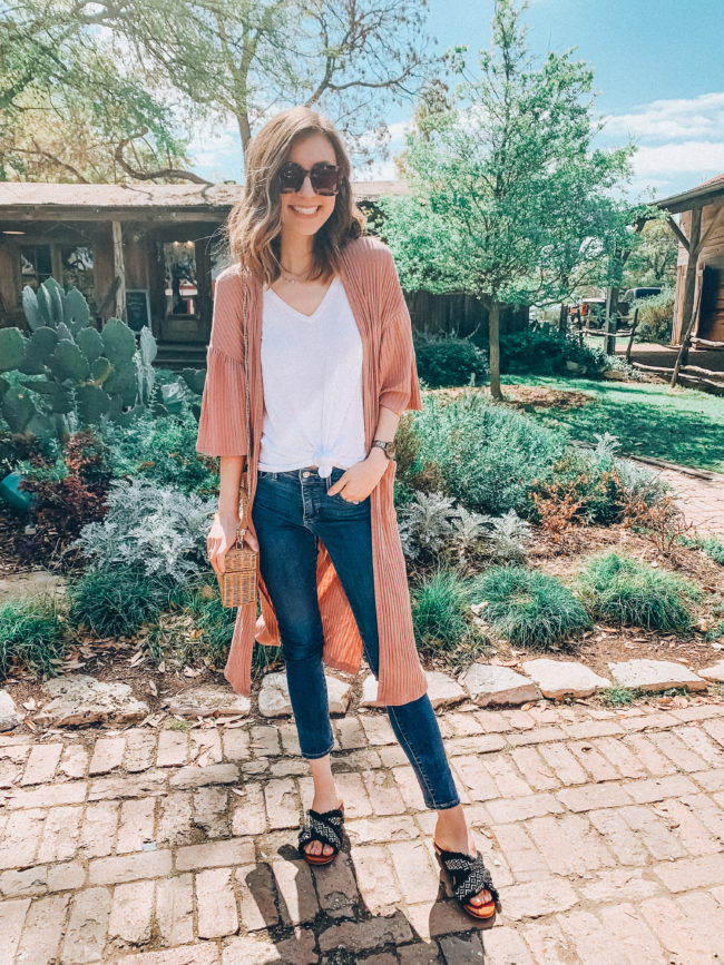 Pink kimono, jeans, and a white knotted tee // Vacation PACKING GUIDE - what I packed for a one week trip to San Antonio | Kansas City life, home, and style blogger Megan Wilson shares all of the items she packed for a one week spring break trip | What to pack for a one week spring break trip | spring and summer outfits | lifeonshadylane.com | @shadylaneblog on IG