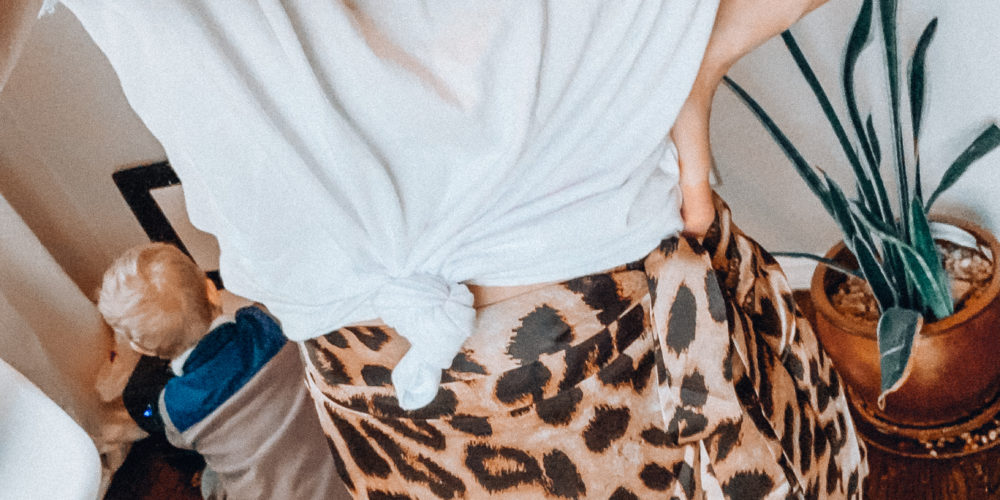 Leopard print skirt and a white knotted tee shirt | Casual everyday spring and summer fashion. Kansas City life, home, and style blogger Megan Wilson shares her Amazon Finds - April | Affordable cute style that's fun and won't break the bank! #amazon #amazonfashion #amazonclothes #amazonfinds #leopard #leopardprint
