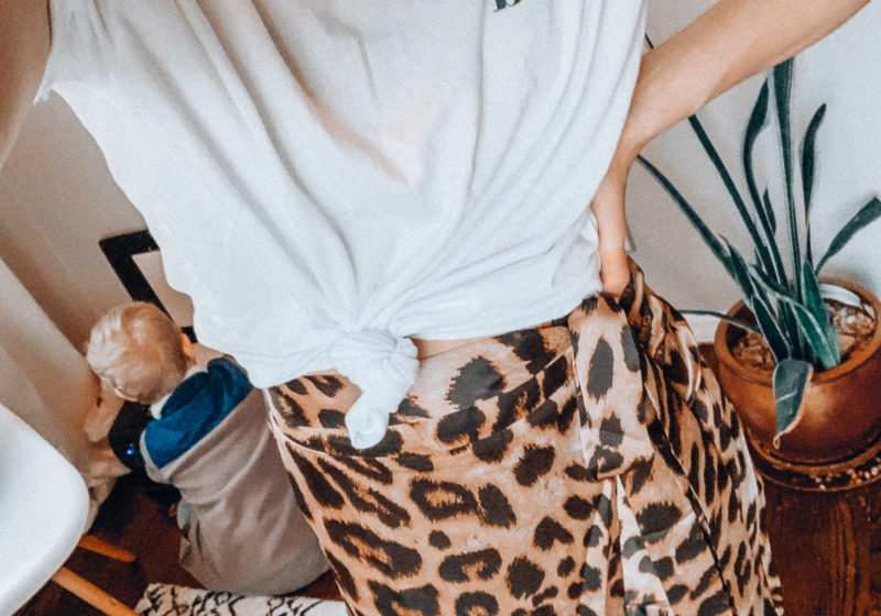 Leopard print skirt and a white knotted tee shirt | Casual everyday spring and summer fashion. Kansas City life, home, and style blogger Megan Wilson shares her Amazon Finds - April | Affordable cute style that's fun and won't break the bank! #amazon #amazonfashion #amazonclothes #amazonfinds #leopard #leopardprint