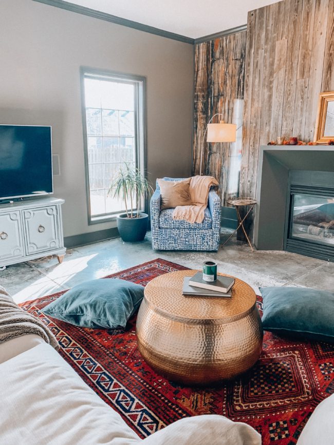 A unique, hammered gold coffee table WITH STORAGE! || Kansas City life, home, and style blogger Megan Wilson shares an update to her living room