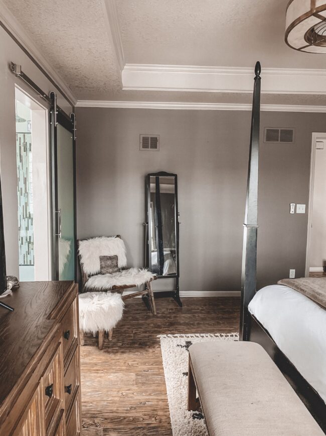 Flokati chair and stool in master bedroom || Neutral master bedroom design, plus the plans we have to change things up! Kansas City life, home, and style blogger Megan Wilson shares her master bedroom design plans and inspiration
