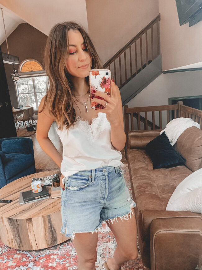 Denim shorts and white lace trim cami outfit || 6 ways to style denim shorts this summer - they're so versatile and go with everything! Which is your favorite denim shorts outfit? || Kansas City life, home, and style blogger Megan Wilson