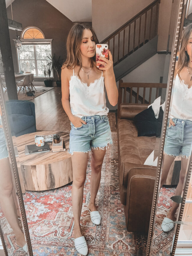 Denim shorts and white lace trim cami outfit || 6 ways to style denim shorts this summer - they're so versatile and go with everything! Which is your favorite denim shorts outfit? || Kansas City life, home, and style blogger Megan Wilson