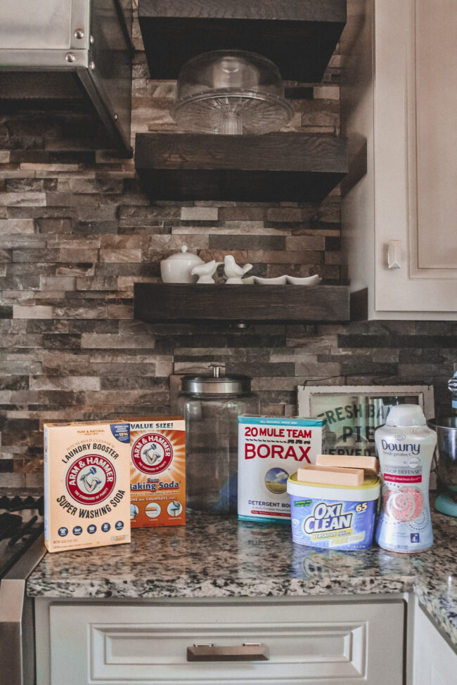 A DIY laundry detergent recipe that's super simple to put together and will save you money (and look pretty on your laundry room shelf!) - here's all you'll need! || Kansas City life, home, and style blogger Megan Wilson shares her DIY laundry detergent recipe!