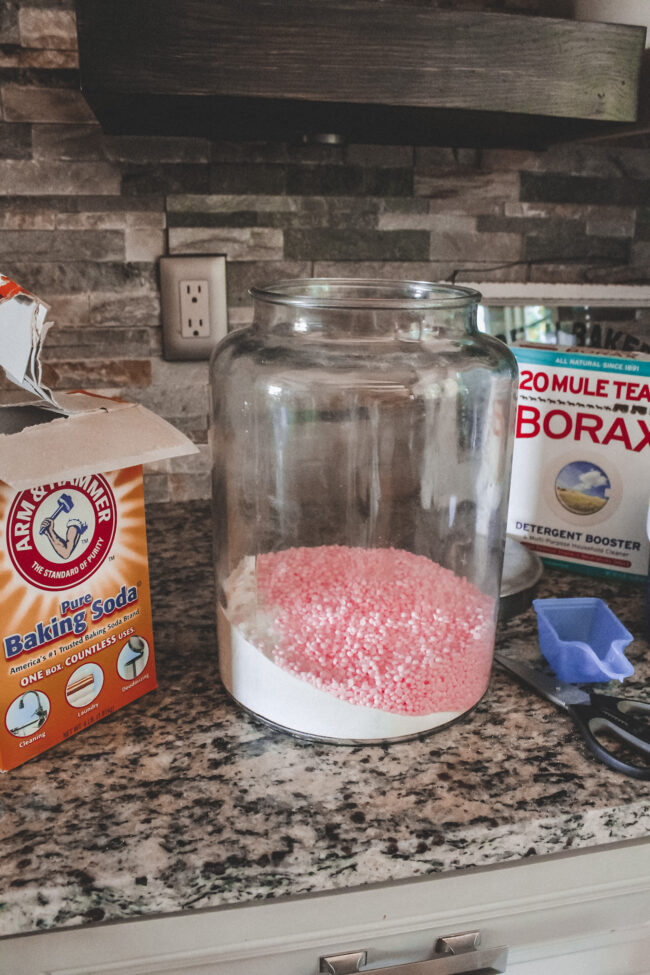 A DIY laundry detergent recipe that's super simple to put together and will save you money (and look pretty on your laundry room shelf!) || Kansas City life, home, and style blogger Megan Wilson shares her DIY laundry detergent recipe!