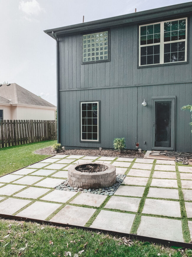 DIY paver patio and firepit - How to build your own patio and firepit! Patio with grass between pavers || Kansas City life, home, and style blogger Megan Wilson shares how to build your own patio and fire pit! 