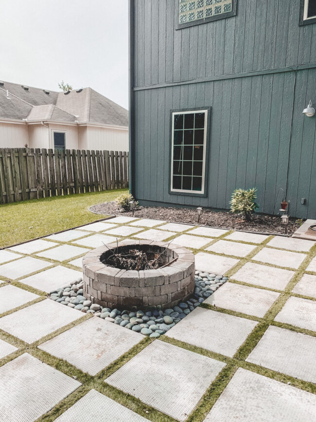 DIY paver patio and firepit - How to build your own patio and firepit! Patio with grass between pavers || Kansas City life, home, and style blogger Megan Wilson shares how to build your own patio and fire pit! 