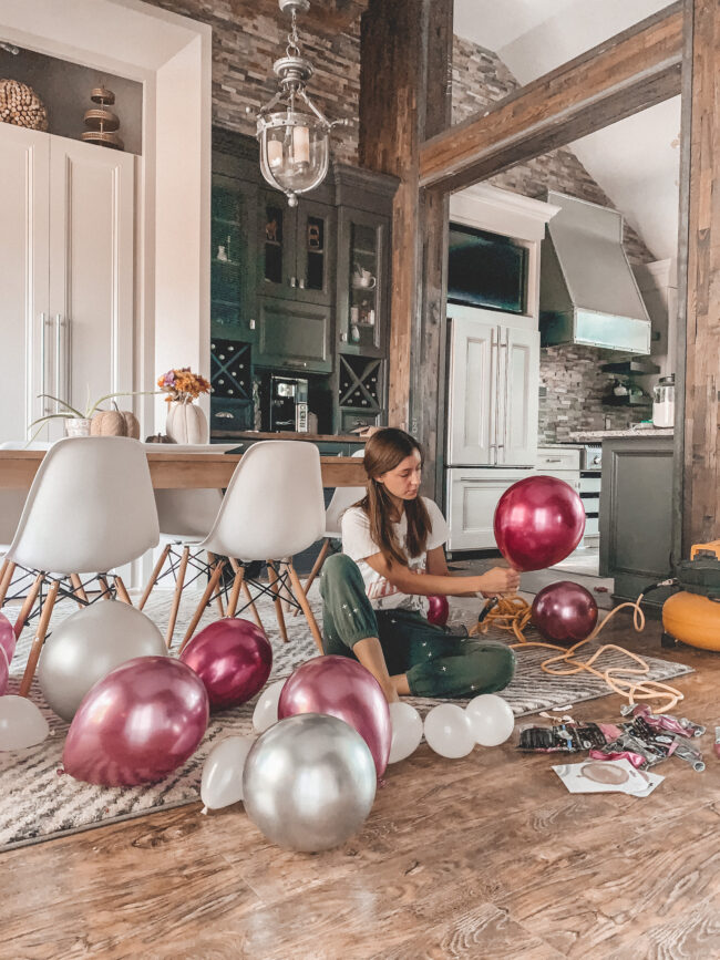 How to make a balloon garland! This post will show you a step-by-step guide to creating your own beautiful balloon garland or balloon arch. #balloongarland