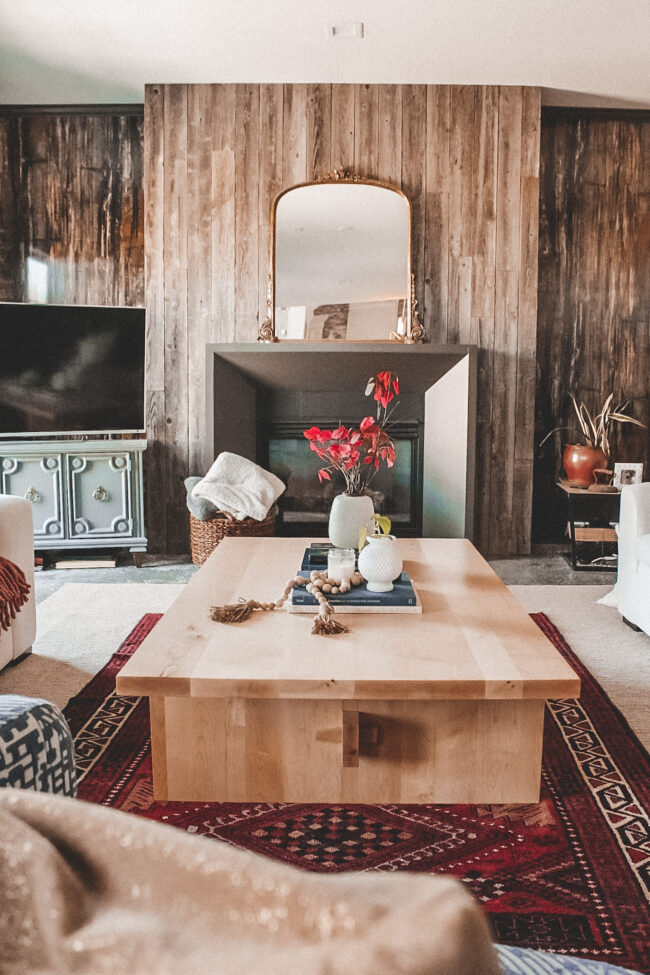 A new rectangle coffee table for our lower level living room - it was customed built by J Thomas Home and turned out beautifully! || Kansas City life, home, and style blogger Megan Wilson shares a new coffee table for her living room